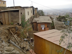 Several houses from the hill near Dios es Amor. Temporary houses like this were created to accommodate people forced to the city by violence in outlying areas.
