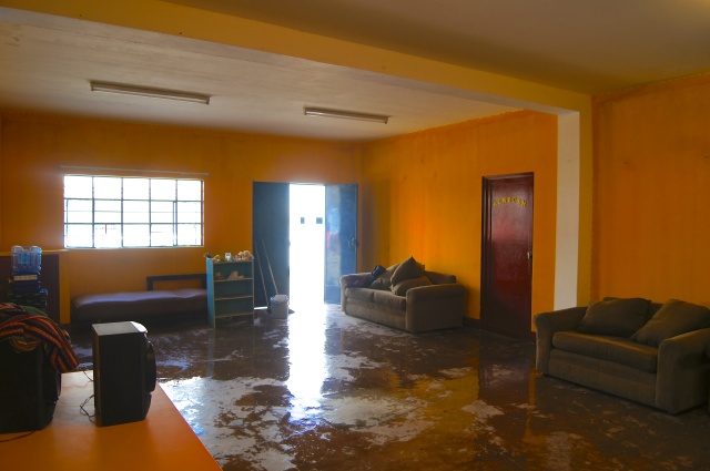 The sunshine reflected on the floor shows how much brighter the room is after painting. 